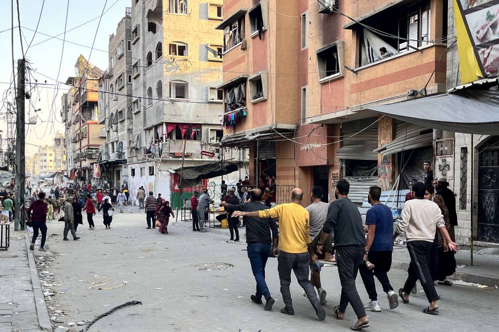 A man who was injured during Israeli bombardment on Beit Lahia, in the northern Gaza Strip, is carried on a stretcher on Nov 4, 2024. - (Photo by AFP)