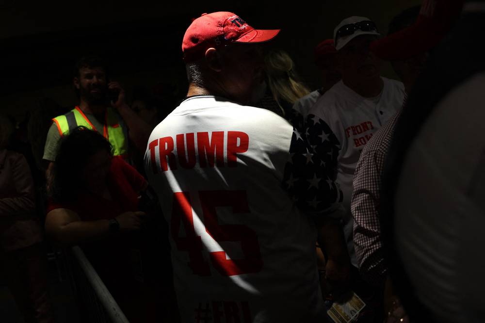 Supporters watch results come in during an election night watch party for Republican presidential nominee, former US President Donald Trump at the Palm Beach Convention Centre on November 05, 2024 in West Palm Beach, Florida. - Photo by AFP