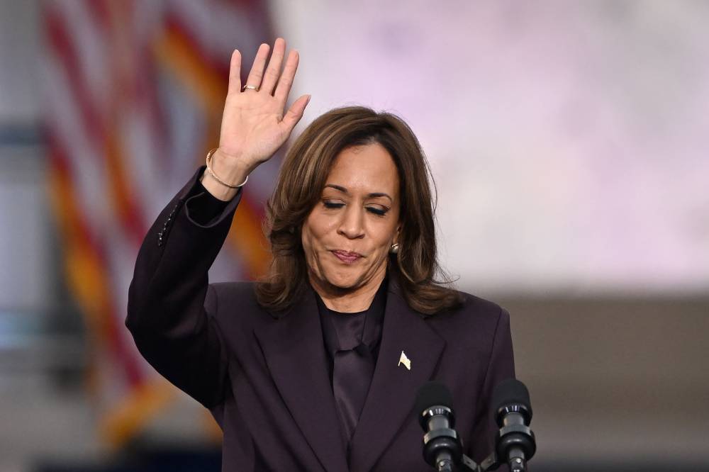 US Vice President Democratic presidential candidate Kamala Harris waves at supporters at the end of her concession speech at Howard University in Washington, DC, on November 6, 2024. - Photo by AFP