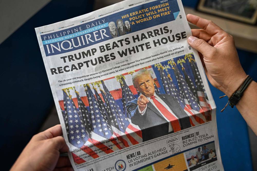 The front page of a newspaper in Manila on Nov 7 showing the re-election of US President-elect Donald Trump. Photo by Jam Sta Rosa/AFP