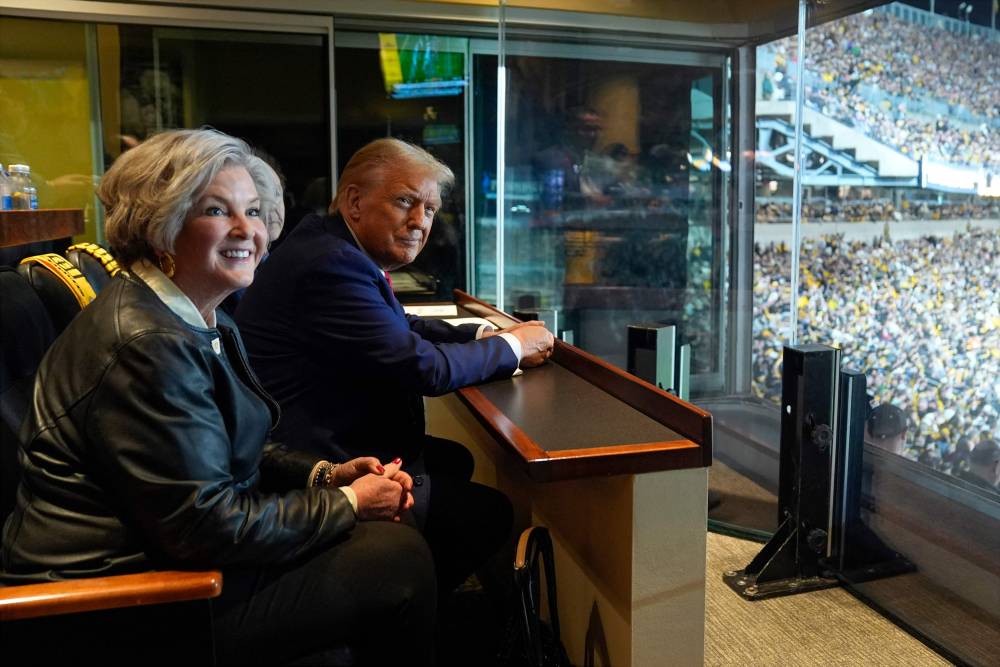 Republican presidential nominee, former President Donald Trump attends a game between the NFL Pittsburgh Steelers and the New York Jets with senior campaign consultant Susie Wiles on October 20, 2024 in Latrobe, Pennsylvania. - File photo by AFP