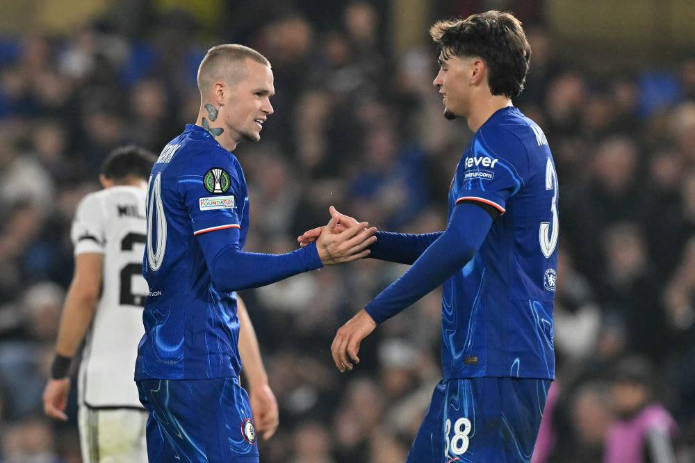 Chelsea's Ukrainian midfielder Mykhailo Mudryk (L) celebrates scoring the team's fifth goal with Chelsea's Spanish striker Marc Guiu during the UEFA Europa Conference League, League Stage football match between Chelsea and FC Noah at Stamford Bridge in London on November 7, 2024. (Photo by Glyn KIRK / AFP)