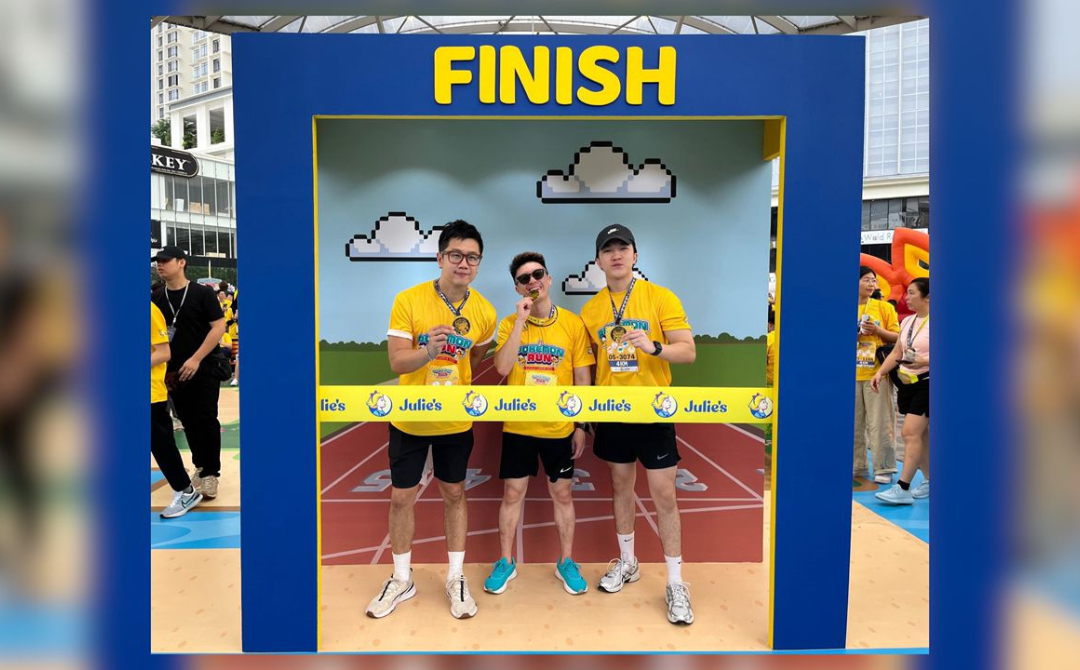 Runners capturing fun memories at the Julie’s photo booth. - Photo by Julie’s management