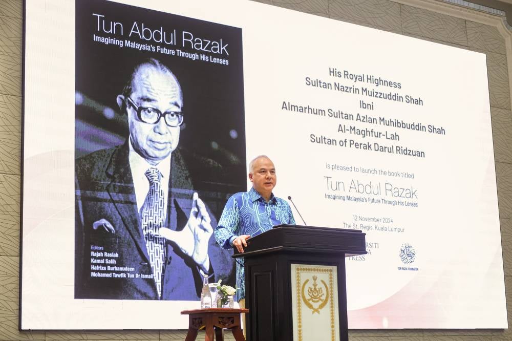 Sultan of Perak Sultan Nazrin Shah delivers a speech at the launch of the book entitled 'Tun Razak: Imagining Malaysia's Future Through His Lenses' at a hotel today. - Photo by Bernama