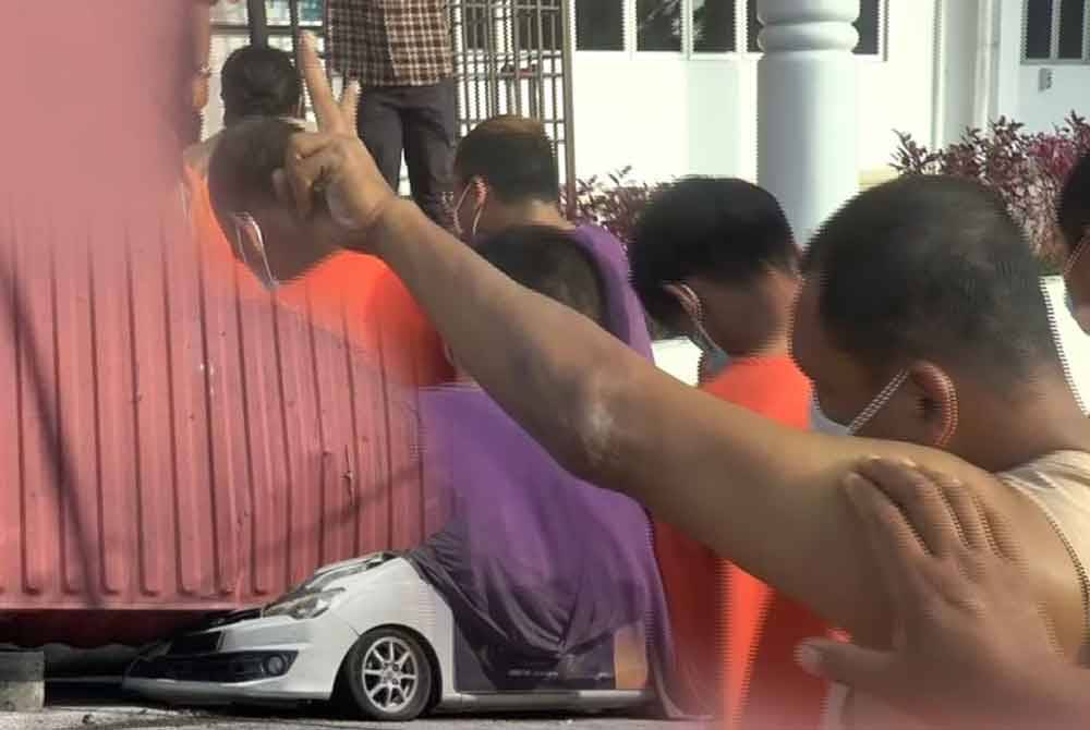 A trailer driver whose container fell in an accident that led to the death of a woman on Jalan Kebun Sireh, Bukit Tengah had flashed a "peace" as he arrived at the Bukit Mertajam magistrate's court, today.