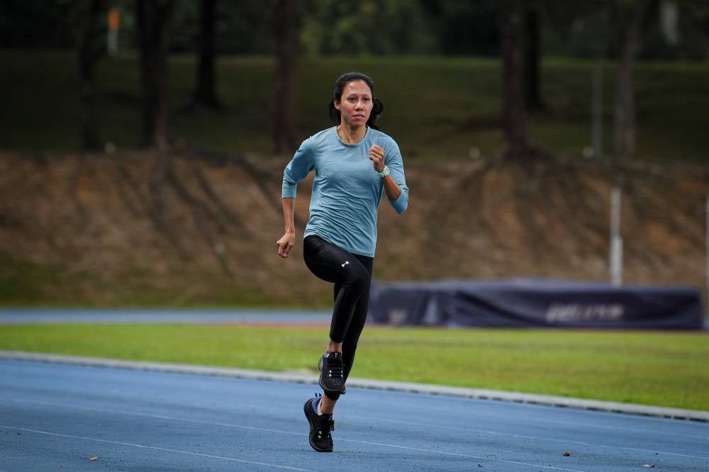 For sprinter Zaidatul Husniah Zulkifli, she acknowledges that AI technology through the use of a smart watch has greatly helped her maintain her performance as she enters her 31st year. Photo by Bernama
