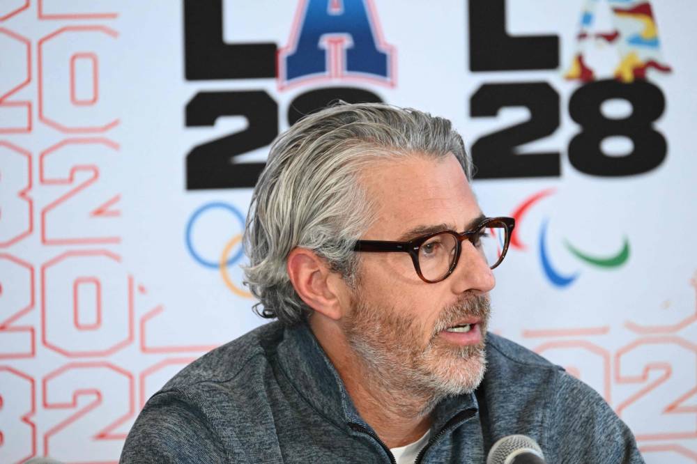 Casey Wasserman, Coordination Commission for the Olympic and Paralympic Games Los Angeles 2028 (LA28) chairperson and president, speaks during an LA28 and International Olympic Committee (IOC) press conference at the University of California Los Angeles campus (UCLA) in Los Angeles, on November 14, 2024. (Photo by Patrick T. Fallon / AFP)