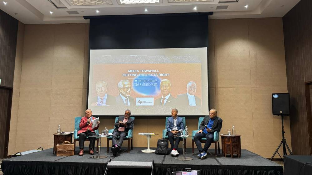 (From left) Kamarudin Ahmad (moderator), lawyer Tan Sri Muhammad Shafee Abdullah, former Dewan Rakyat speaker Tan Sri Azhar Azizan Harun and lawyer Adzly Abdul Manas during the Media Townhall: Getting the Facts Right – The Untold Stories of 1MDB & Other Cases, in Kuala Lumpur, today.
