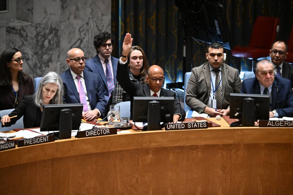 US Alternate Ambassador to the United Nations Robert Wood raises his hand to veto a draft resolution calling for a ceasefire in Gaza, during a United Nations Security Council meeting to discuss the situation in the Middle East on Nov 20, 2024, at UN headquarters in New York City. - (Photo by ANGELA WEISS / AFP)