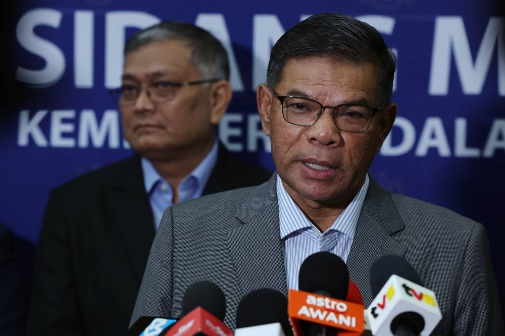 Home Minister Datuk Seri Saifuddin Nasution Ismail during a press conference at the ministry's Monthly Assembly today which was also attended by Deputy Minister Datuk Seri Dr Shamsul Anuar Nasarah. - Photo by Bernama