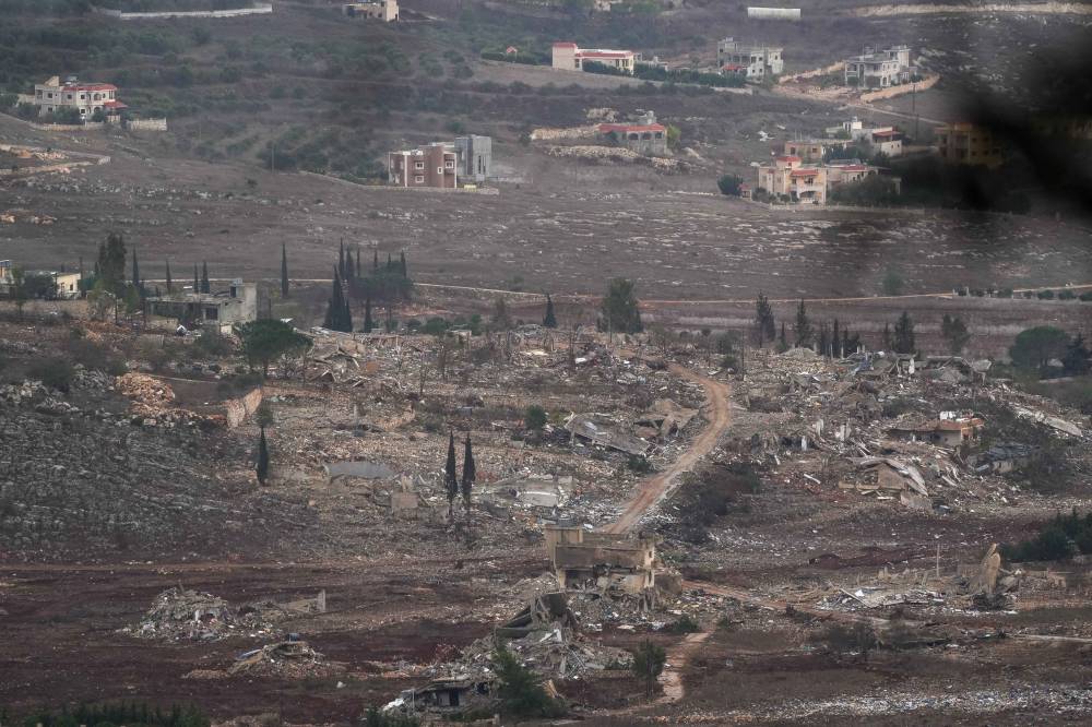 Photo taken on Nov 25, 2024 shows destroyed houses at a village in southern Lebanon, as seen from northern Israeli border. - Photo by XINHUA