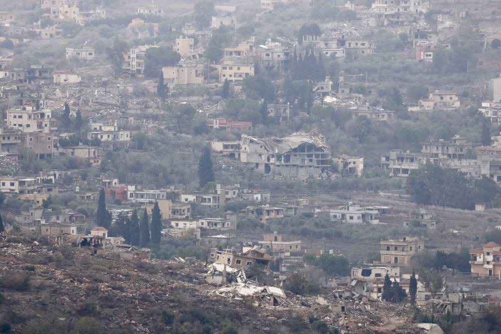 This photo taken from Israel's side of the Israel-Lebanon border on Nov 27, 2024 shows destroyed buildings in southern Lebanon. (Photo by Jamal Awad/Xinhua)