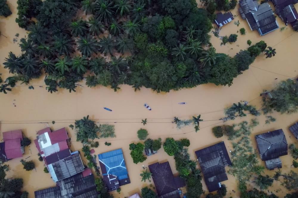 An aerial view of the flood situation in Kampung Matang on Dec 1. - Photo by Bernama