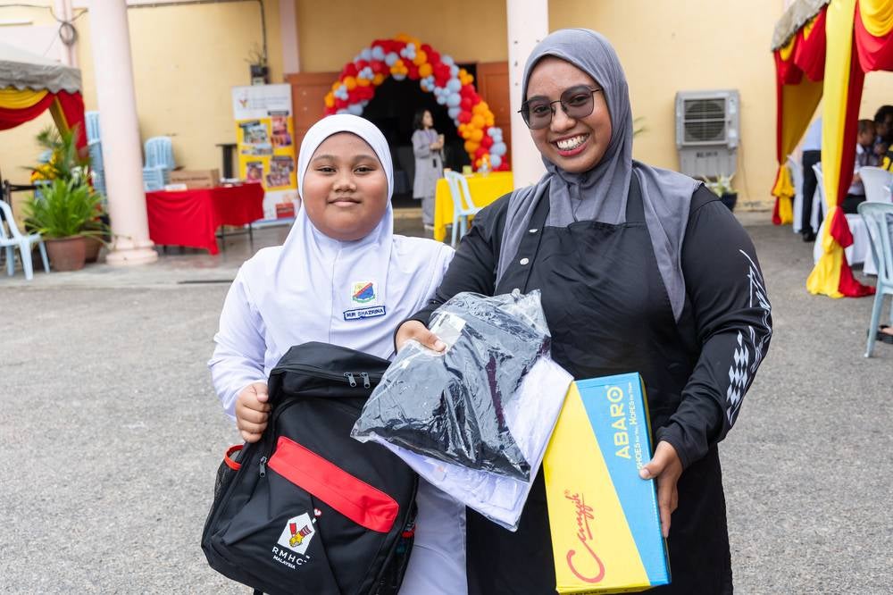 The programme not only eases parents' financial burdens but also motivates children to attend school.
Photo courtesy of McDonald's Malaysia. 
