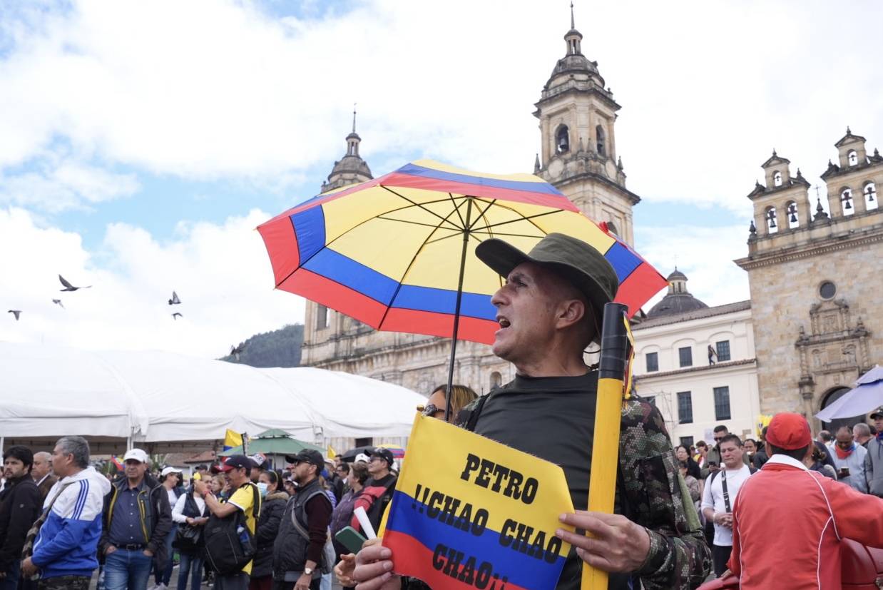 People gather at the Bolivar Square as the former members of the Colombian Military Forces march to protest against Colombian President Gustavo Petro in Bogota, Colombia on November 23, 2024. (Juancho Torres - Anadolu Agency)