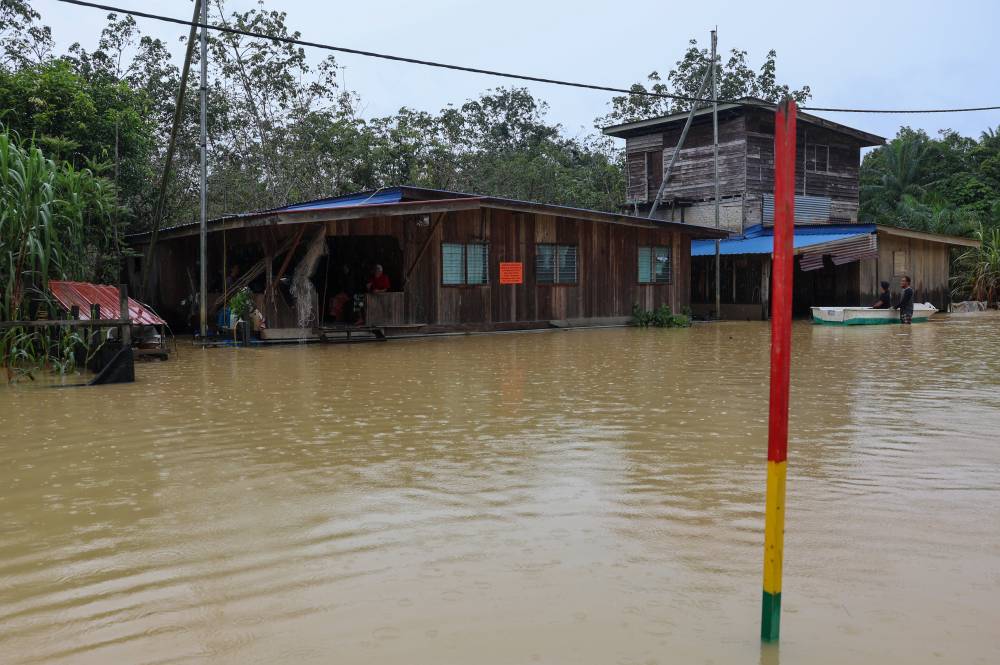 The floating house owned by A. Bakar Ahmad, affectionately called Pokwe, 70, in Kampung Tebak Batu 16. Photo by Bernama