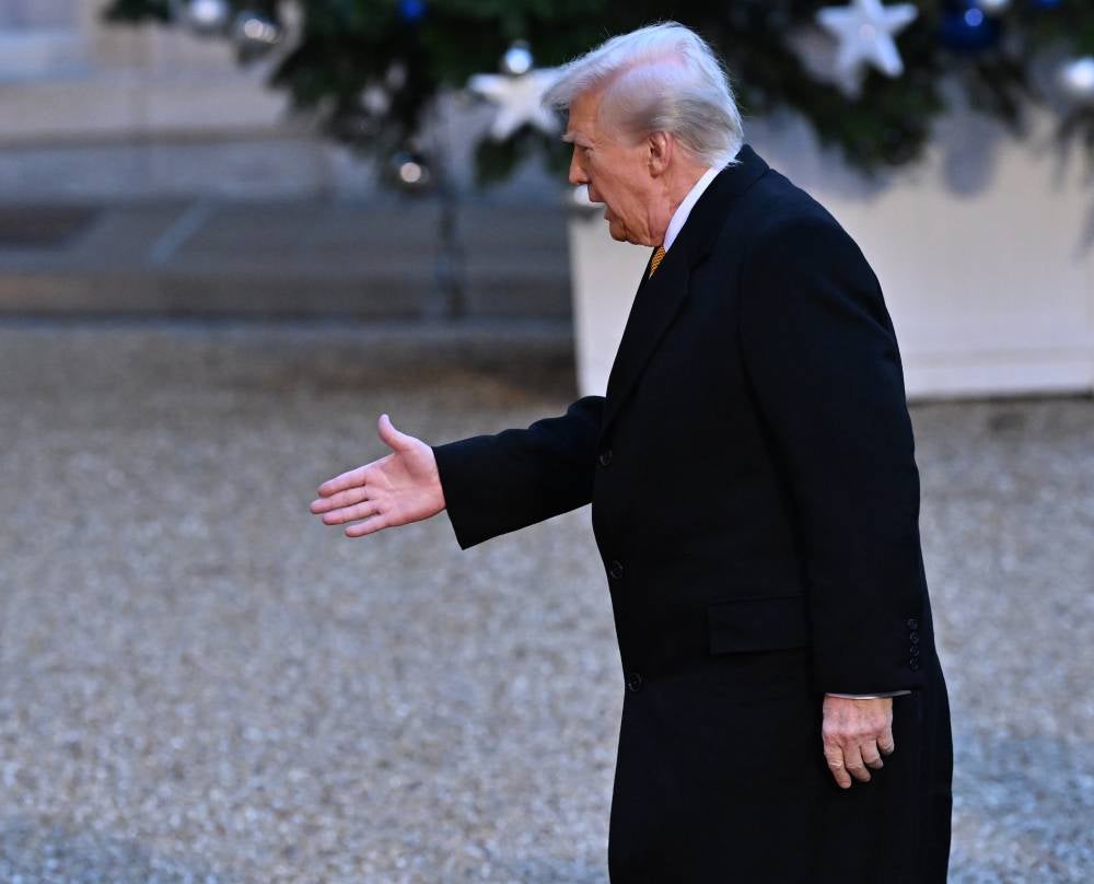 President-elect Donald Trump arrives to meet with French President Emmanuel Macron (not seen) at the Elysee Palace in Paris, France on Dec 7, 2024. - (Photo by Mustafa Yalçın / Anadolu Agency)