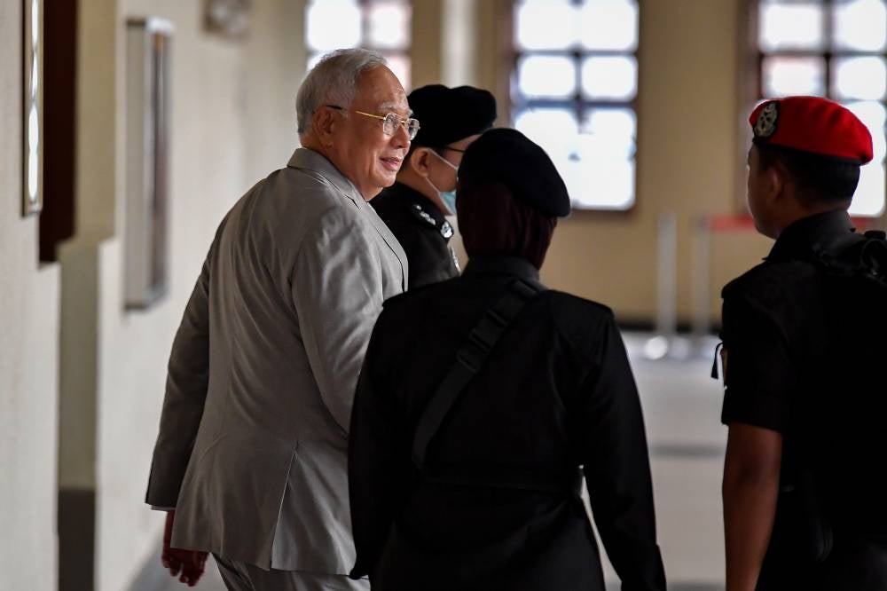 Former prime minister Datuk Seri Najib Razak at the Kuala Lumpur High Court for his 1MDB trial, today. - Photo by Bernama
