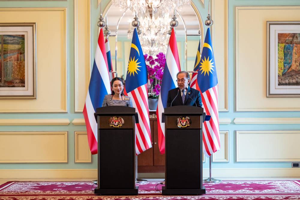 Prime Minister Datuk Seri Anwar Ibrahim at the joint press conference with the Thailand's Prime Minister Paetongtarn Shinawatra at Perdana Putra yesterday. - Photo by Bernama