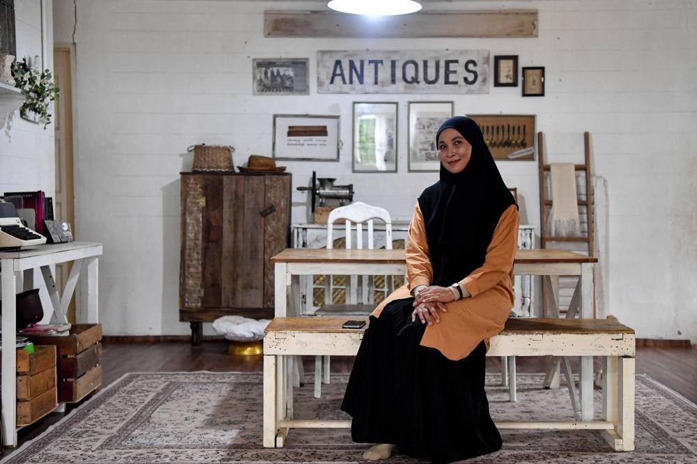 Norpadilah shared that with a creative touch, discarded wood - often considered worthless - can be transformed into beautiful decorative items with monetary and sentimental value. - Photo by Bernama