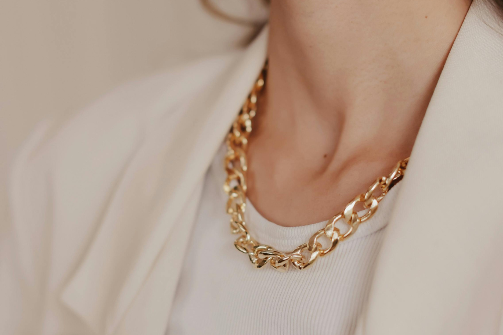 For accessories, you can opt for bold ones, such as a silk scarf, tie, or jewellery. - Canva