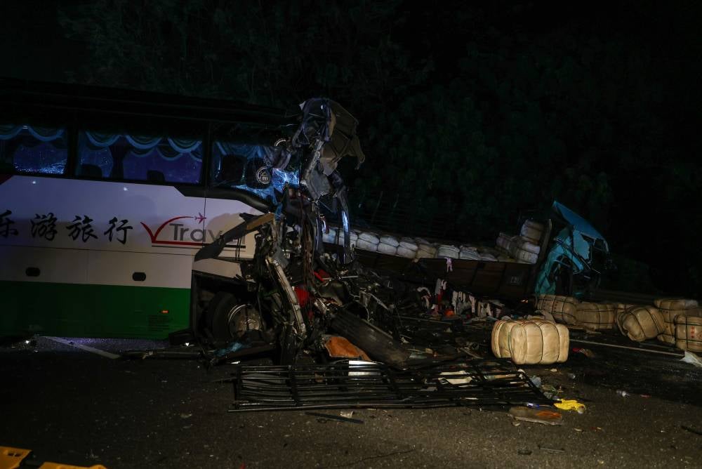 The accident involved a tour bus carrying 27 passengers, a trailer and a Toyota Estima. Photo by Bernama