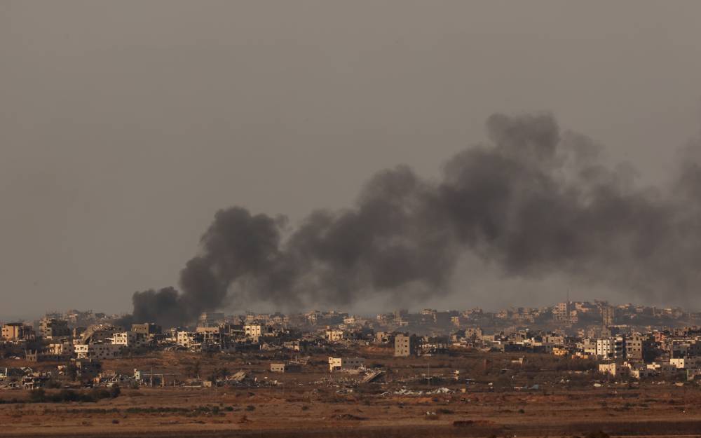 Smoke billows following Israeli strikes in the Gaza Strip on Dec 22, 2024. - (Photo by Gil Cohen M / Xinhua)
