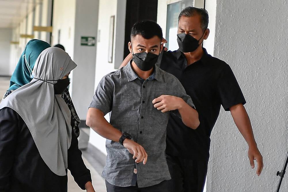 The accused, Amirul Iskandar Norhanizan, 22, faces a charge of intentionally causing injury to Muhammad Salman Mohd Saiful Surash, 20, by using a hot steam iron, at the UPNM ALK in Sungai Besi, at 11.45pm on Oct 22. - Photo by Bernama