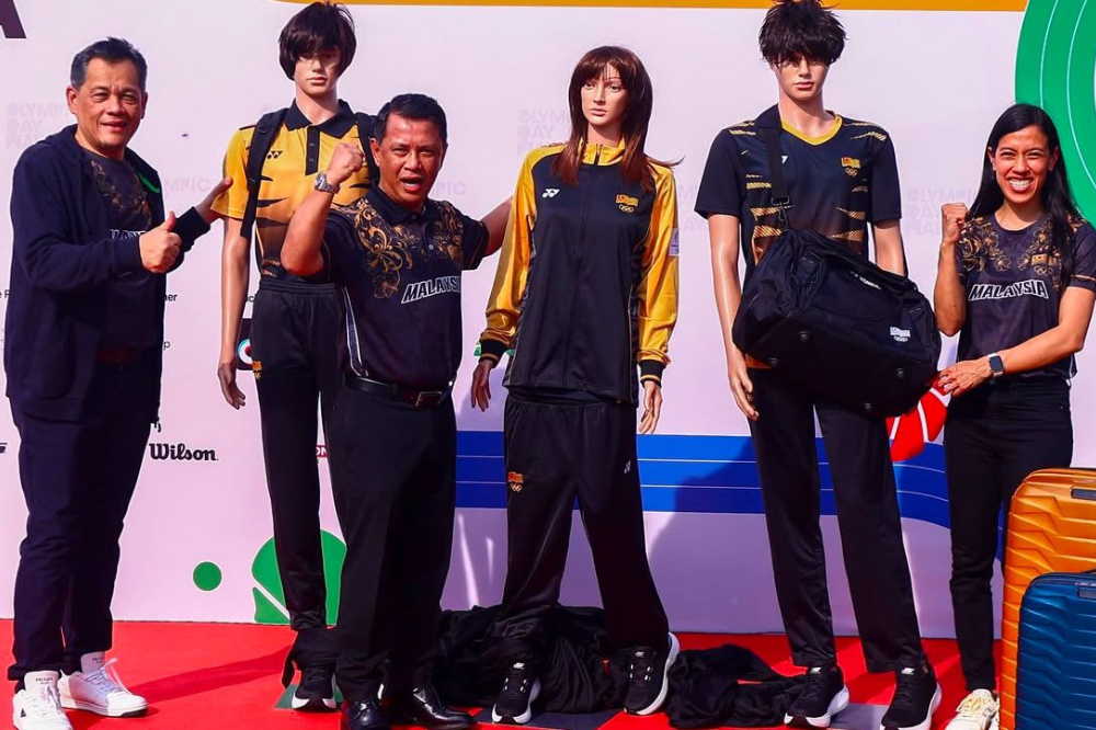 @olympicmas posting the official attire for 2024 Olympic Games Paris' Malaysian athletes, before the announcement backfired.