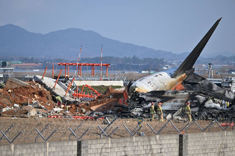 Only two of the 181 people on board survived the deadly crash. - Photo by Xinhua
