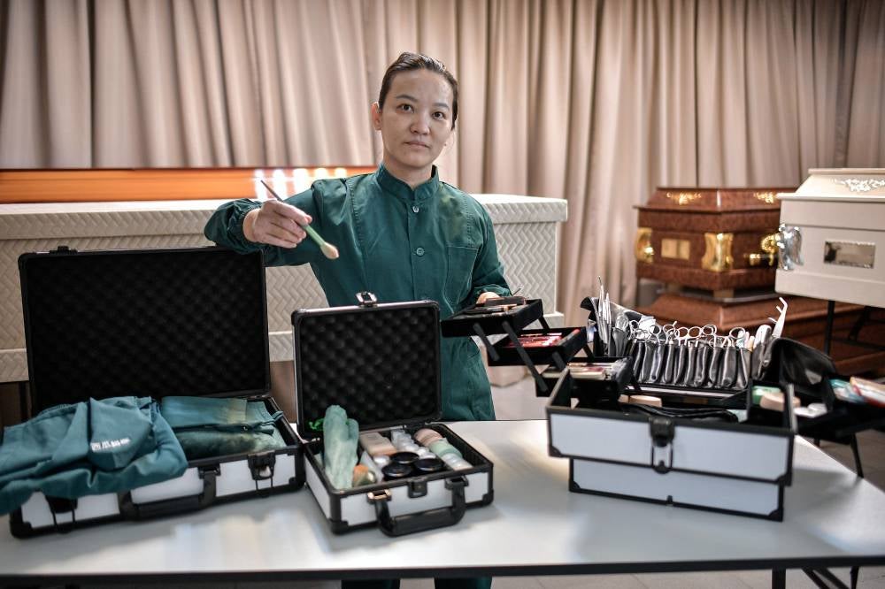 Aileen Ong takes pride in her career as a mortician and funeral director, a profession she has embraced for the past 12 years. Photo by Bernama