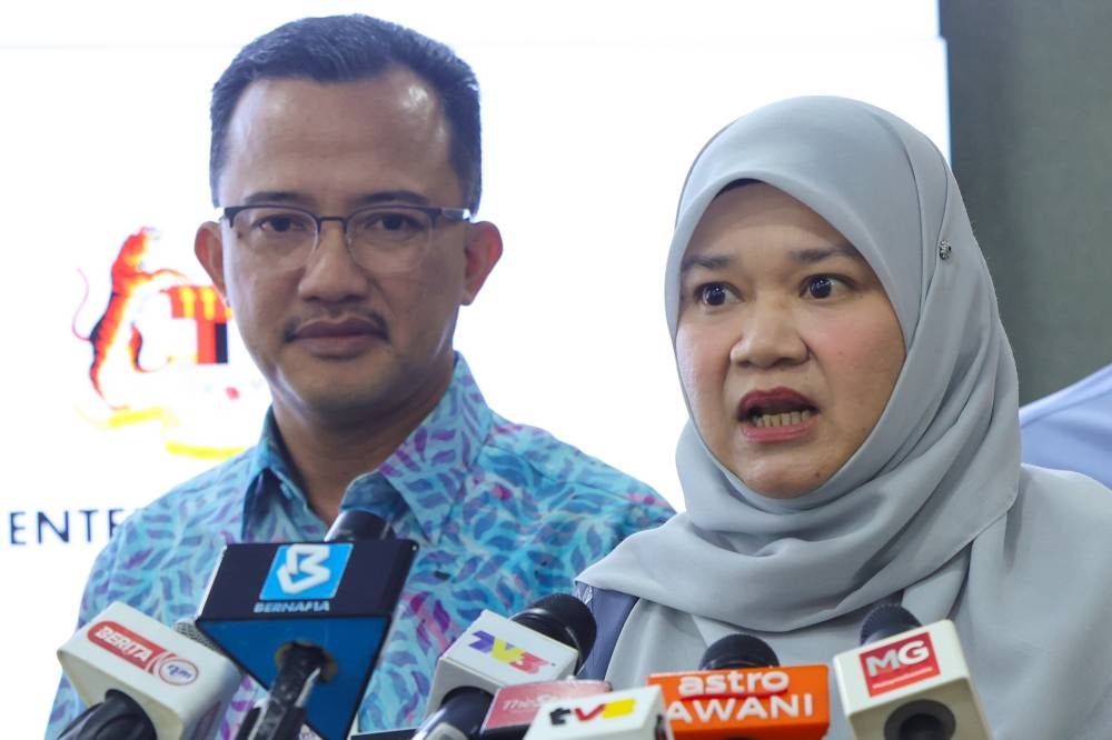 Education Minister Fadhlina Sidek (right) during a press conference at the ministry, today. - Photo by Bernama