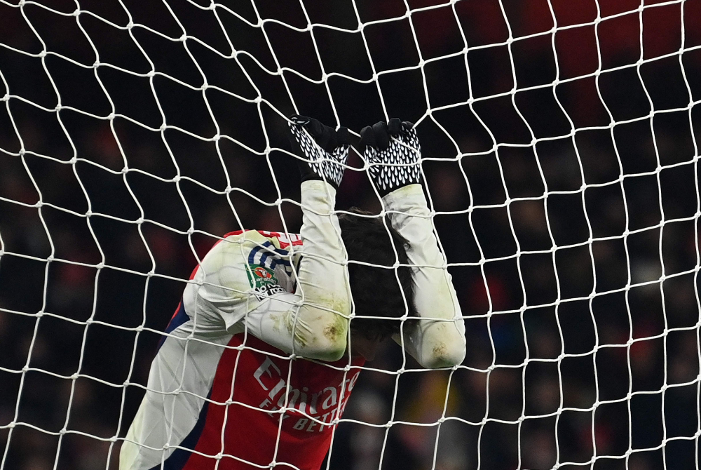 Arsenal's German midfielder Kai Havertz reacts after failing to score during the English League Cup semi-final first leg football match between Arsenal and Newcastle United at the Emirates Stadium, in London on January 7, 2025. (Photo by Glyn KIRK / AFP)