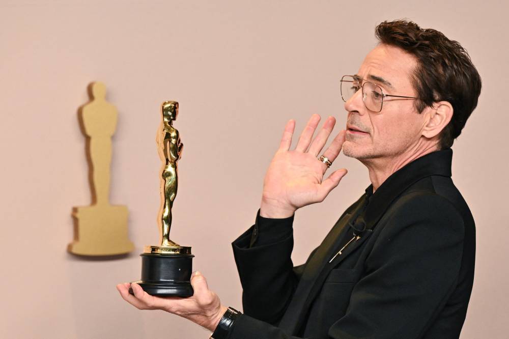 US actor Robert Downey Jr. poses in the press room with the Oscar for Best Actor in a Supporting Role for "Oppenheimer" during the 96th Annual Academy Awards at the Dolby Theatre in Hollywood, California on March 10, 2024. - (AFP file photo by ROBYN BECK)
