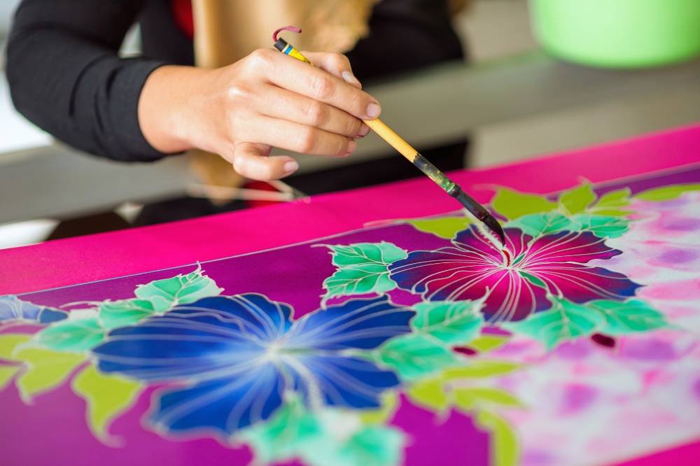 With its kaleidoscope of colors and motifs, Malaysian batik is a visual representation of the nation’s diverse heritage and creativity. Photo: Canva