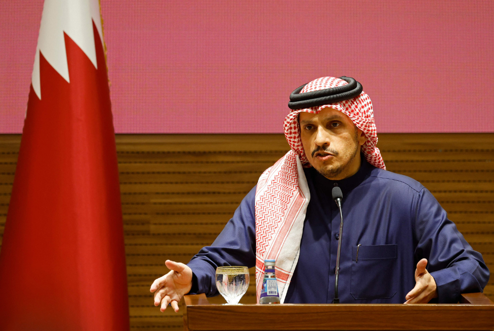 Qatar’s Prime Minister Sheikh Mohammed bin Abdulrahman bin Jassim Al-Thani addresses a press conference at the Diwan Annex in Doha on January 15, 2025. (Photo by KARIM JAAFAR / AFP)
