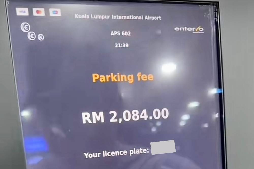 A TikTok video shared by user @yaya.tasha has gone viral after revealing a staggering parking fee of RM2,084 at KLIA. Photo: @yaya.tasha TikTok account.