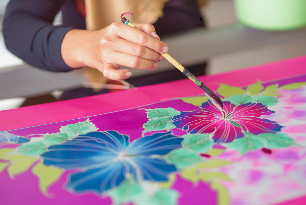 The batik industry has immense potential to flourish through collaborative efforts between the government and private sector. - Canva