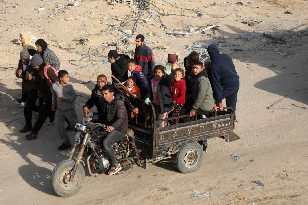 Palestinians return to the southern Gaza Strip city of Rafah on Jan 19, 2025. (Photo by Rizek Abdeljawad/Xinhua)