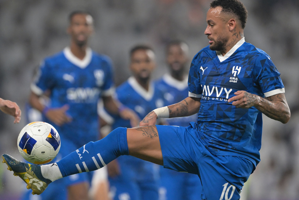Hilal's Brazilian forward Neymar controls the ball during the AFC Champions League group B football match between UAE's Al-Ain and Saudi's Al-Hilal at the Hazza bin Zayed Stadium in al-Ain on October 21, 2024.(Photo by AFP)