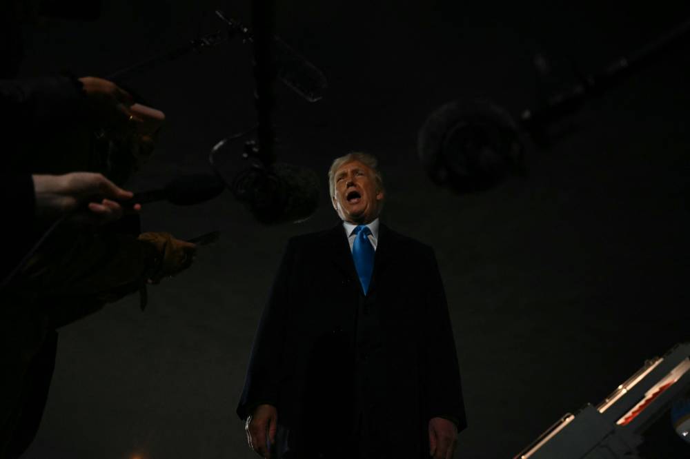 US President Donald Trump speaks to the press upon arrival at Joint Base Andrews in Maryland on Feb 2, 2025, as he returns to the White House from Florida. - (Photo by JIM WATSON / AFP)