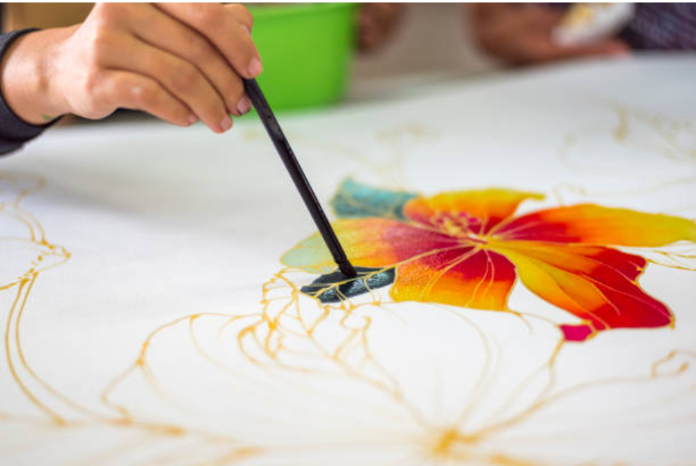 Malaysian batik is distinct for its bold colors and nature-inspired motifs, such as flowers and leaves. Photo: Free stock images