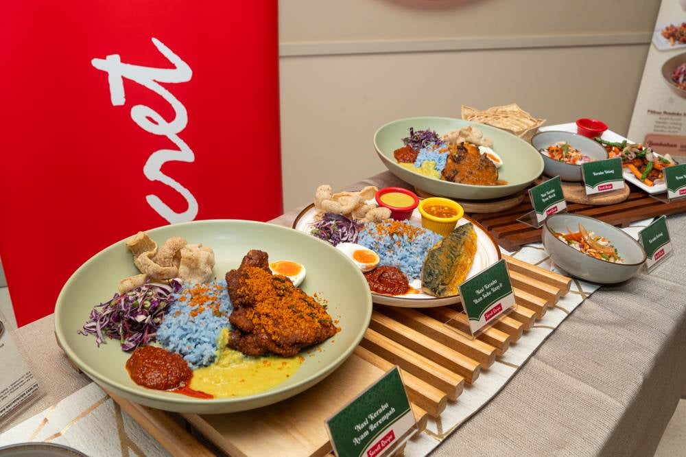 The three main course menu items are (from left) Nasi Kerabu Ayam Berempah, Nasi Kerabu Ikan Saba Kunyit, and Nasi Kerabu Ayam Percik.