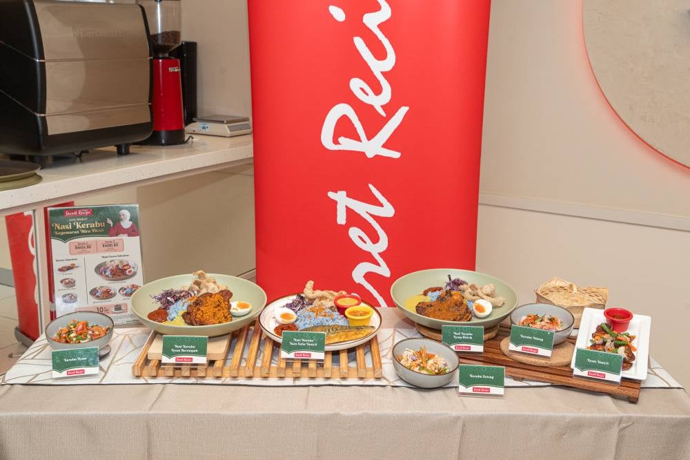 The starters include Ayam Kunyit, Kerabu Udang / Sotong and Kerabu Ayam, and the main course include Nasi Kerabu Ayam Berempah, Nasi Kerabu Ayam Percik and Nasi Kerabu Ikan Saba Kunyit. Customers can choose between two set options: A set for two, offering one starter and two main courses at RM56.80; or a set for three, offering two starters and three main courses priced at RM80.80.