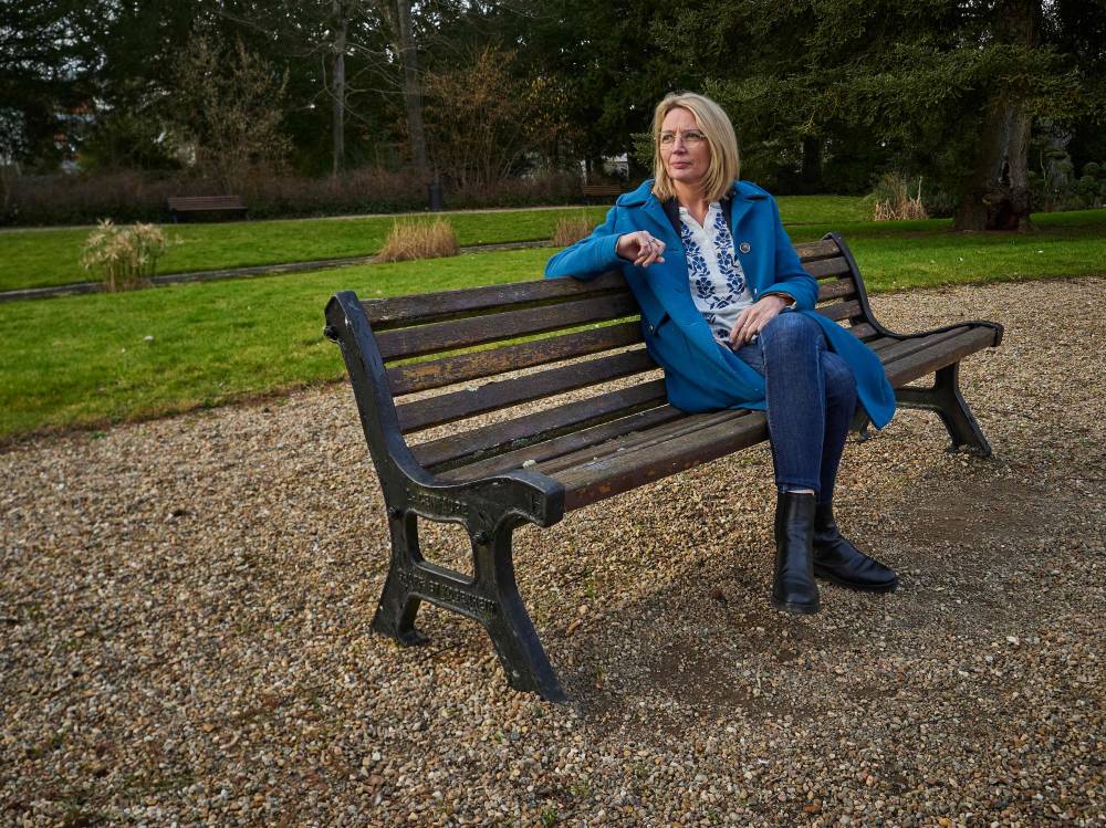 Amelie Leveque, 42, who was operated on by the former surgeon Joel Le Scouarnec when she was 9, poses in a garden after she agreed to speak openly, in Loches, central France on February 18, 2025. (Photo by GUILLAUME SOUVANT / AFP)
