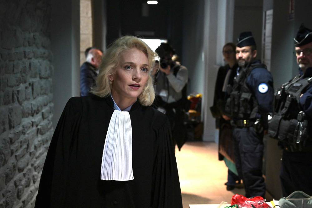 French plaintiffs lawyer Marie Grimaud arrives to the Criminal Court, on the opening day of the trial of retired surgeon Joel Le Scouarnec on charges of assaulting or raping 299 patients in Vannes. Photo by Damien Meyer/AFP.