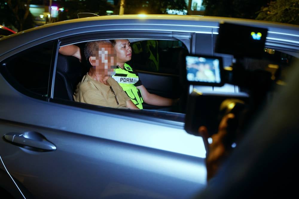 The arrest of the individual was carried out at 11pm (Feb 24) by MCMC in collaboration with the police in Kuala Lumpur, after an arrest warrant was issued by a Sepang Sessions Court judge earlier. - Bernama photo