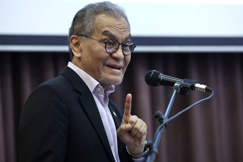 Dr Dzulkefly Ahmad delivering his speech at the national World Cancer Day 2025 celebration with the theme ‘Unity in Uniqueness’. Photo by Bernama