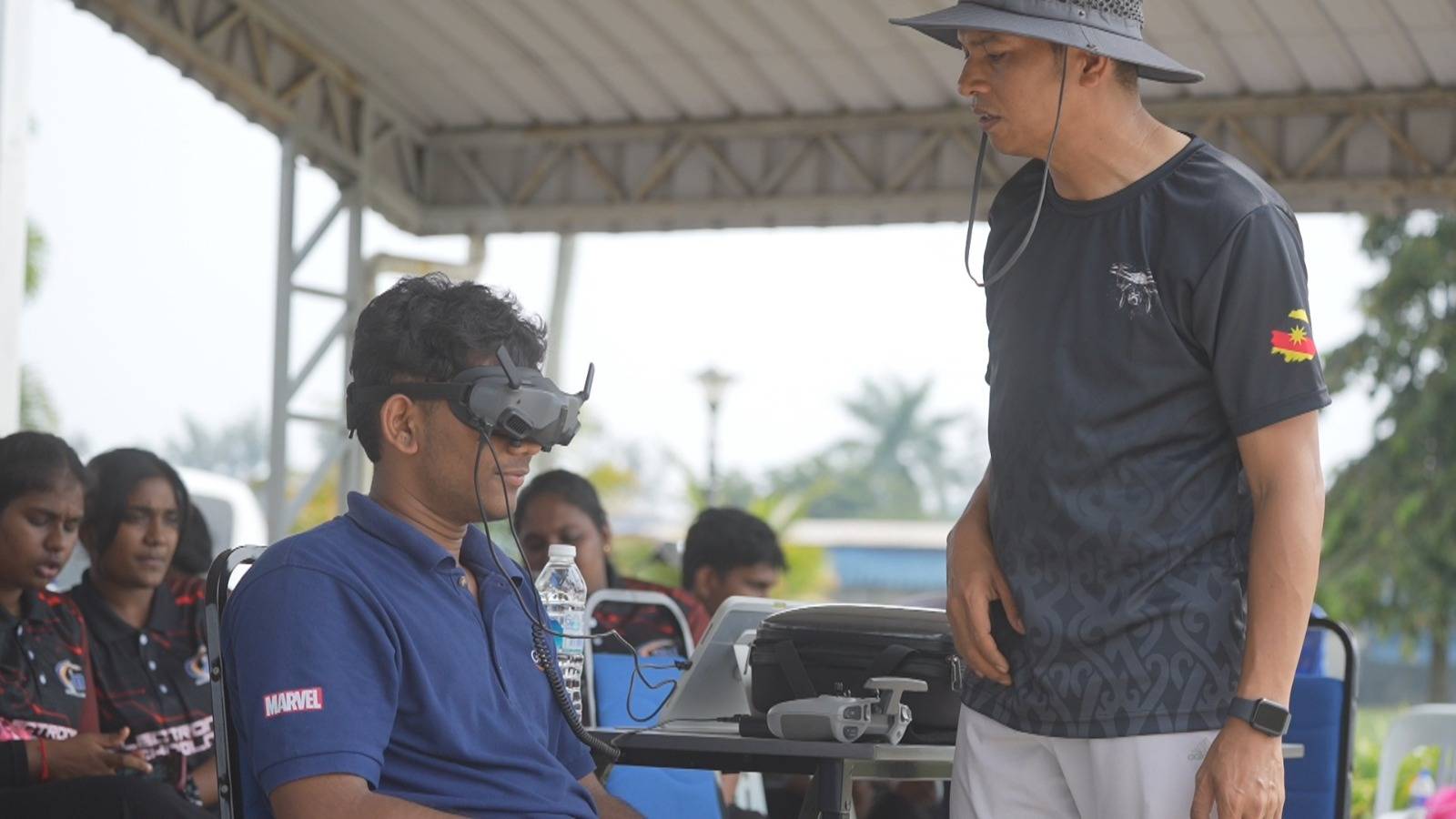 A hands-on drone training session where participants experience first-person view (FPV) technology. Photo: HRD Corp's management 