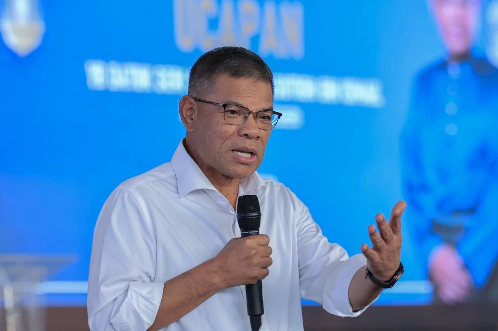 Home Minister Datuk Seri Saifuddin Nasution Ismail delivering his speech during a breaking of fast gathering with media practitioners today. - Photo by Bernama